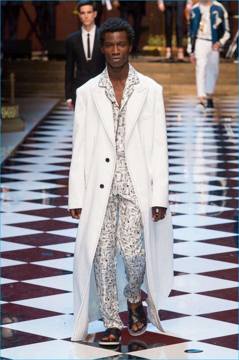 Dolce & Gabbana has a chic summer white moment with a long tailored coat.
