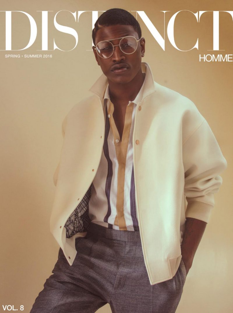 Dominique Hollington covers the latest issue of Distinct Homme in a shirt and bomber jacket from Perry Ellis.
