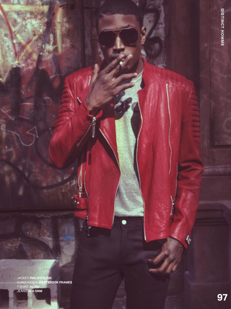 Dominique Hollington is red hot in a leather moto jacket from Philipp Plein.