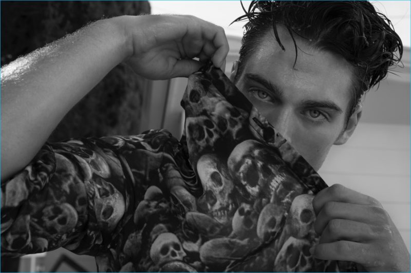 Dylan Sprayberry styled by Douglas VanLaningham in a skull print t-shirt.