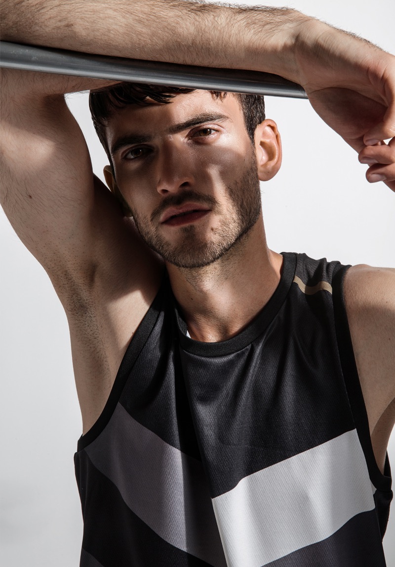 Robert models a sporty tank from H&M's For Every Victory collection.