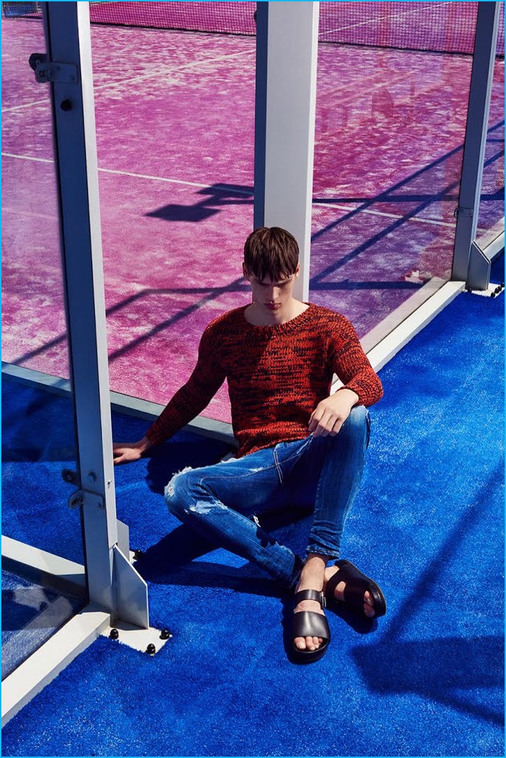 Filip Hrivnak goes casual in ripped Dsquared2 jeans with a Pepe Jeans marle knit sweater and Hermes sandals.