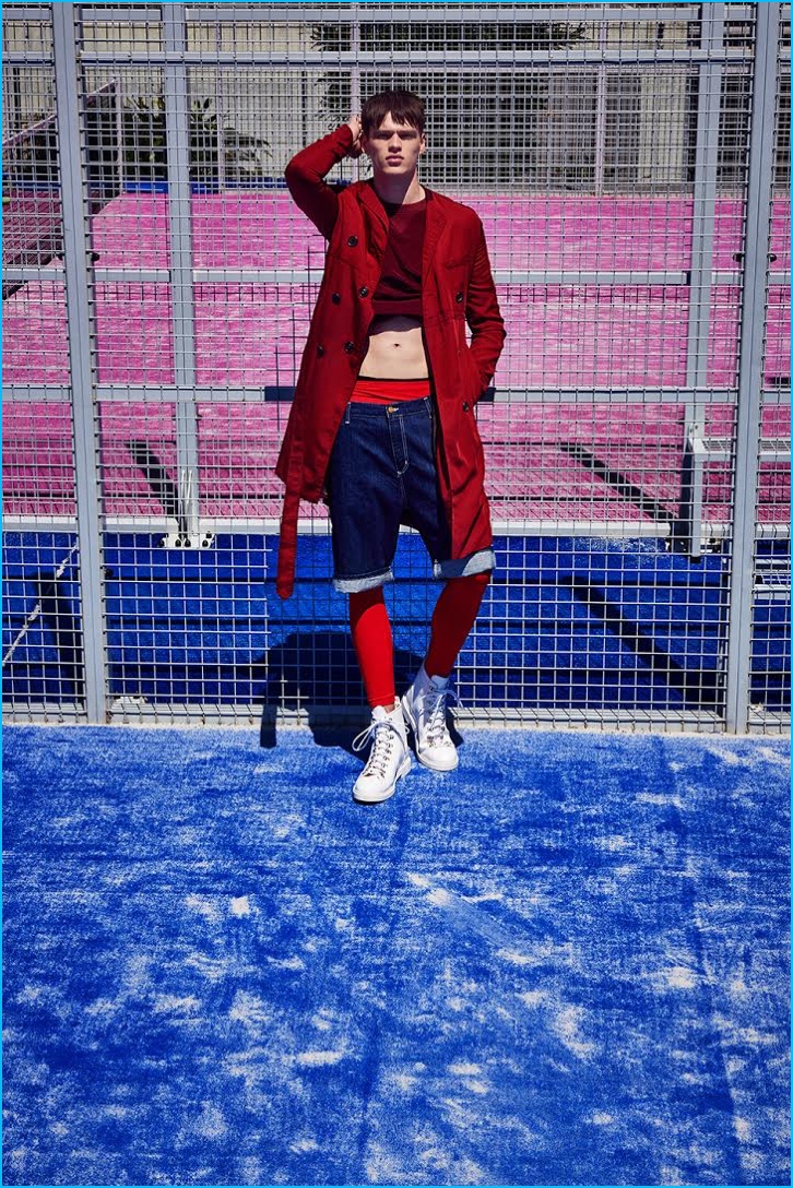 Filip Hrivnak is a red and blue vision in a Canali trench with Carhartt denim shorts.