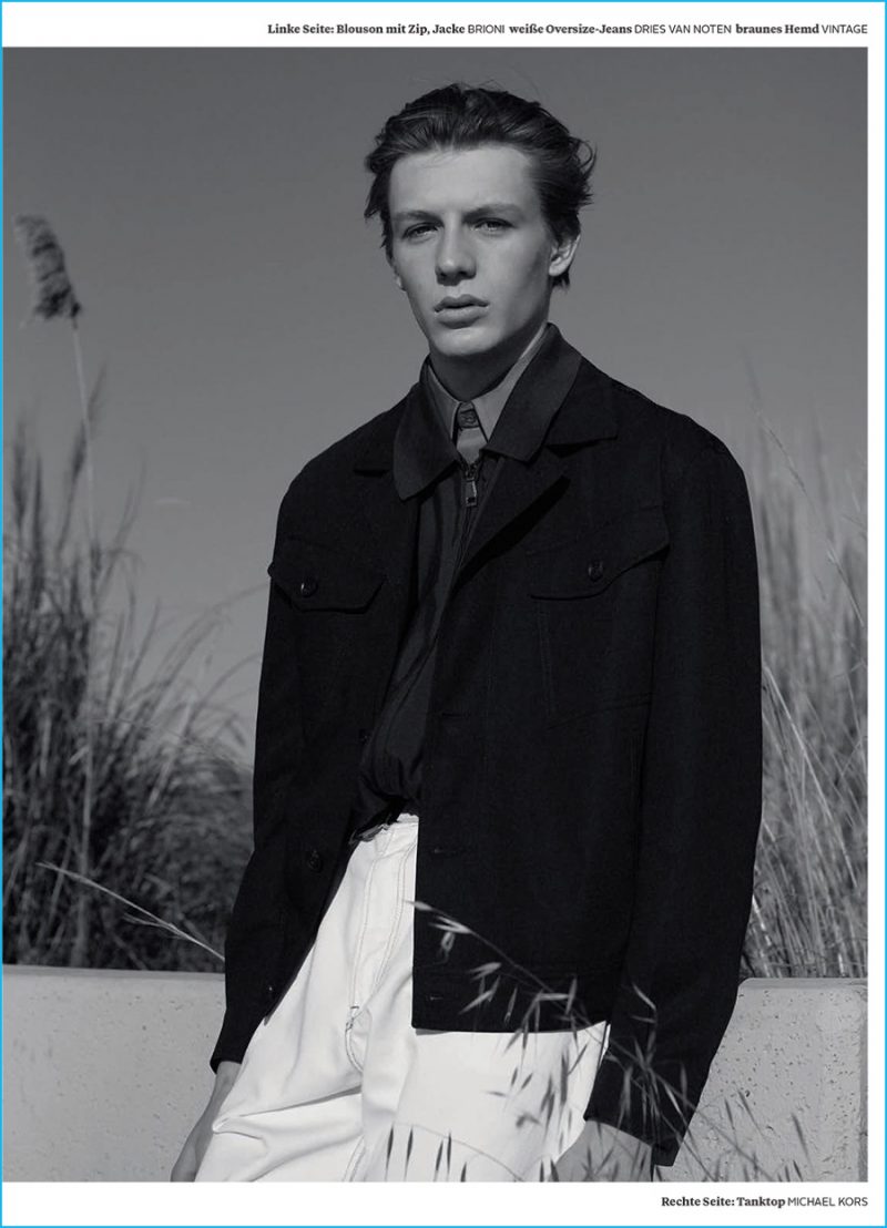 Finnlay dons a short jacket from Brioni with Dries Van Noten jeans.