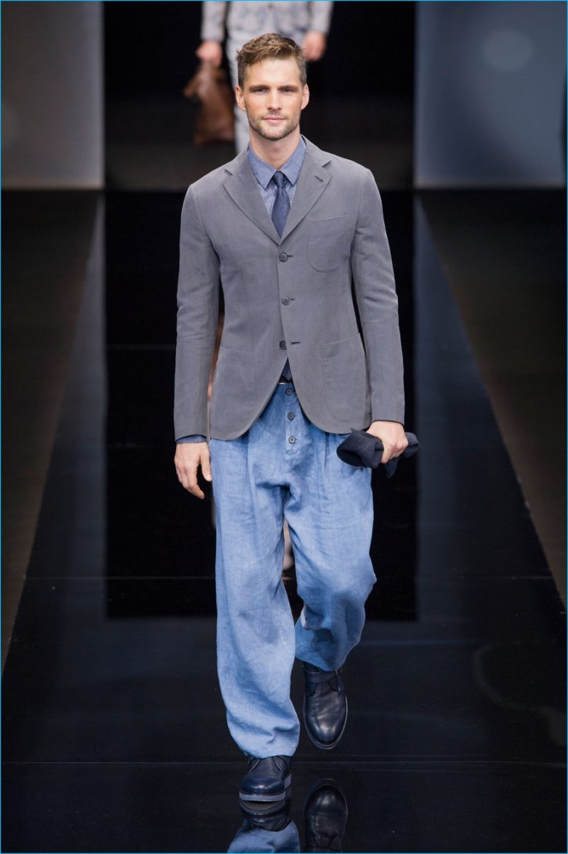 Giorgio Armani balances proportions with fitted blazers and relaxed trousers.