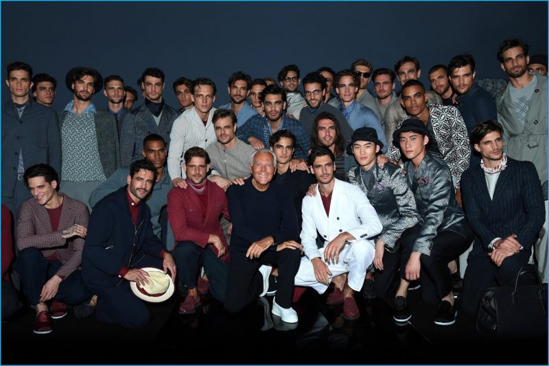 Giorgio Armani poses with models that walked his namesake brand's spring-summer 2017 show.