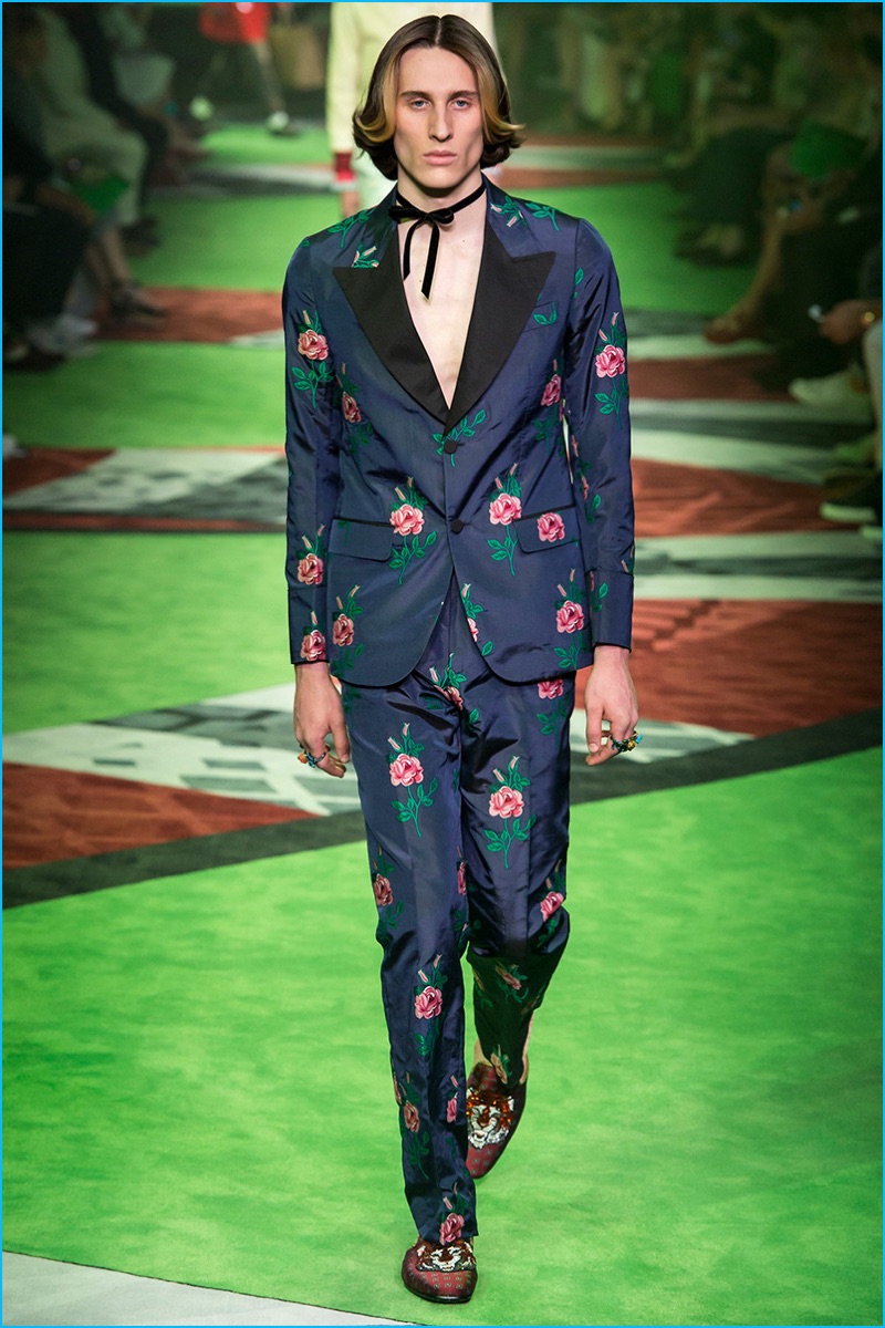 Gucci continues its penchant for floral adorned suiting.