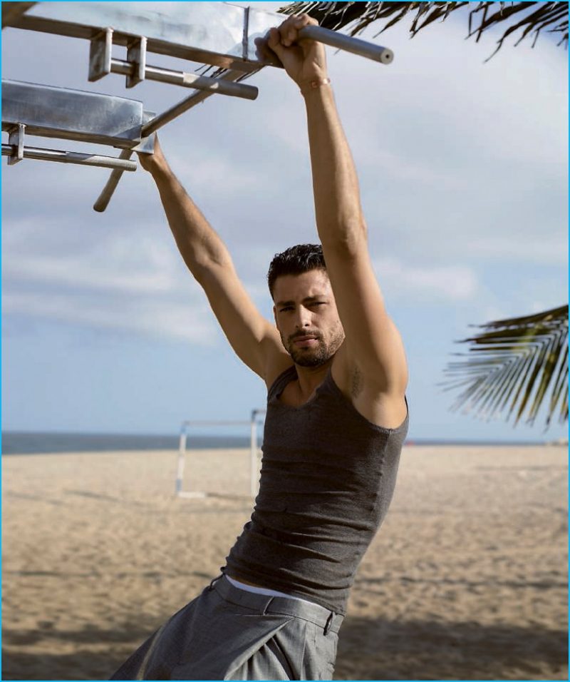 Cauã Reymond takes to the beach for a sporty day out with Harper's Bazaar España.