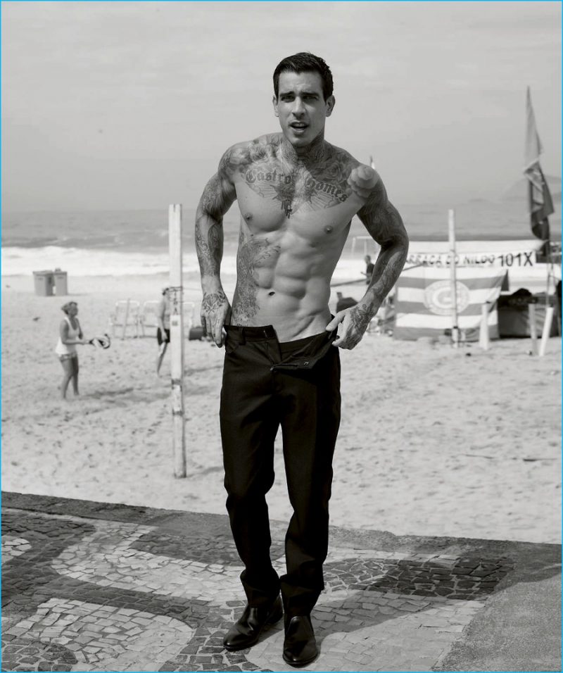 Diogo de Castro Gomes shows off his tattoos as he hits the beach shirtless with Harper's Bazaar España.