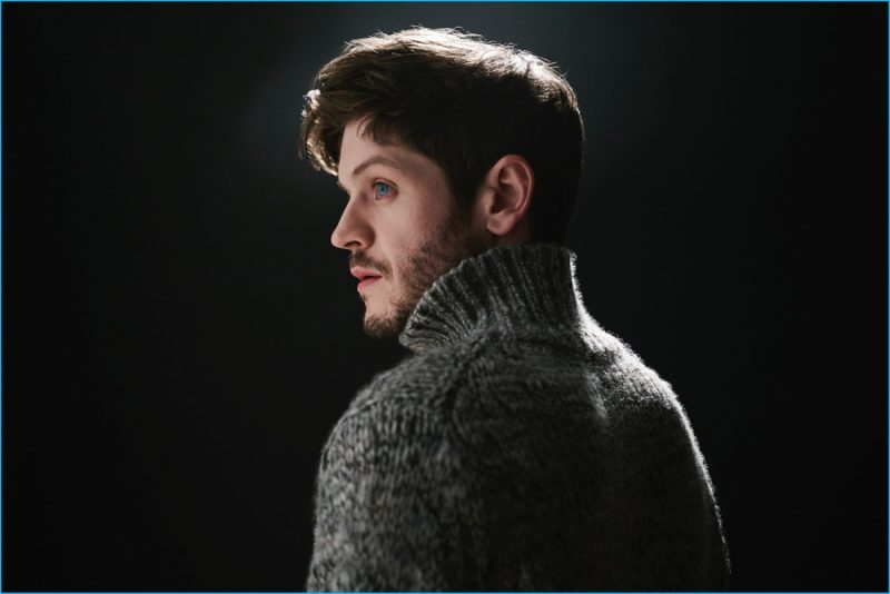 Iwan Rheon poses for a portrait wearing a turtleneck sweater from Whistles.