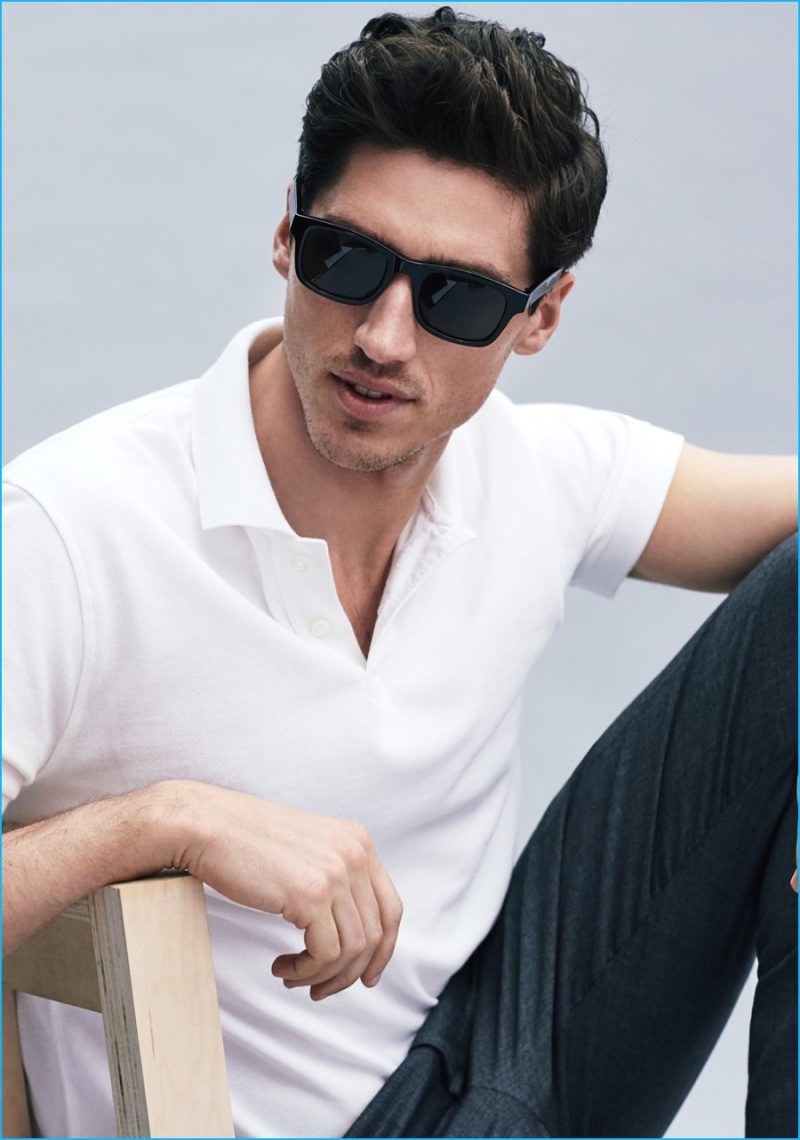 Ryan Kennedy pictured in J.Crew's white piqué polo shirt.