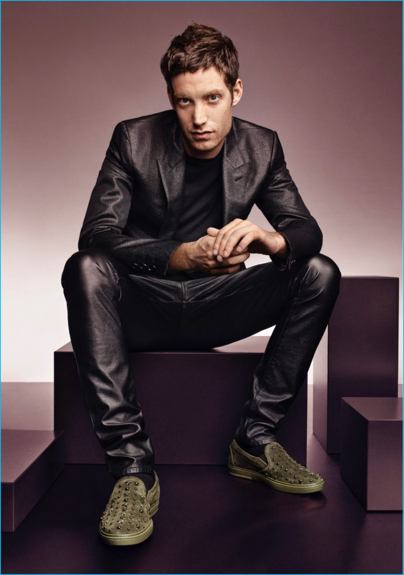 James Jagger sports studded shoes with a grey suit for Jimmy Choo's fall-winter 2016 men's campaign.