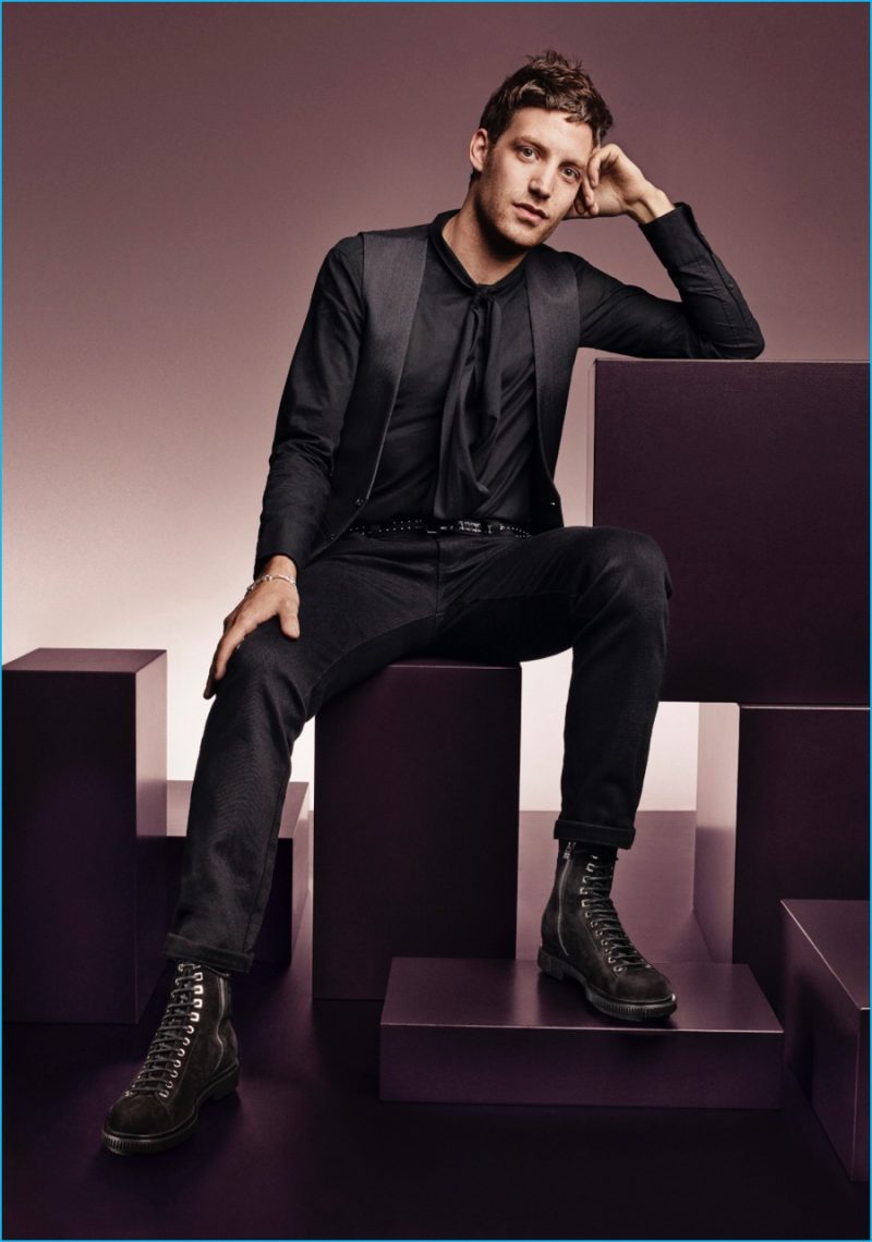 Pictured in zip-up boots, James Jagger brings a modern rock attitude to Jimmy Choo's fall-winter 2016 men's campaign.