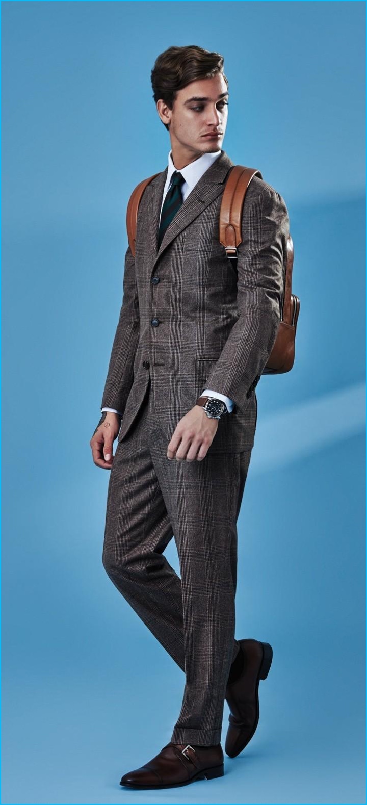 Jonathan Bellini is a chic vision in a Brunello Cucinelli suit.