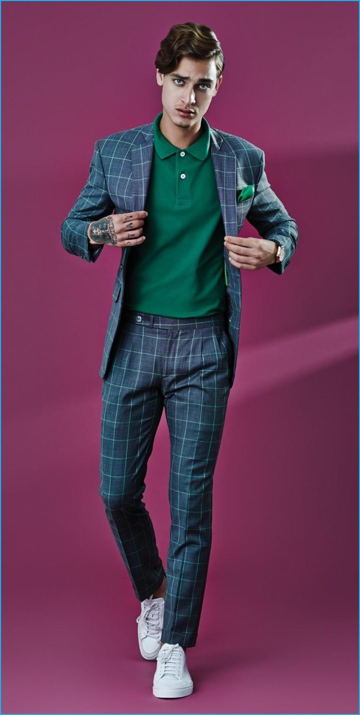 Jonathan Bellini sports a Highstil polo shirt with a windowpane print Alexandre Won suit.