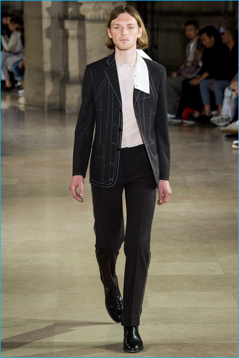 Maison Margiela embraces an unfinished theme with its tailored suits for spring-summer 2017.