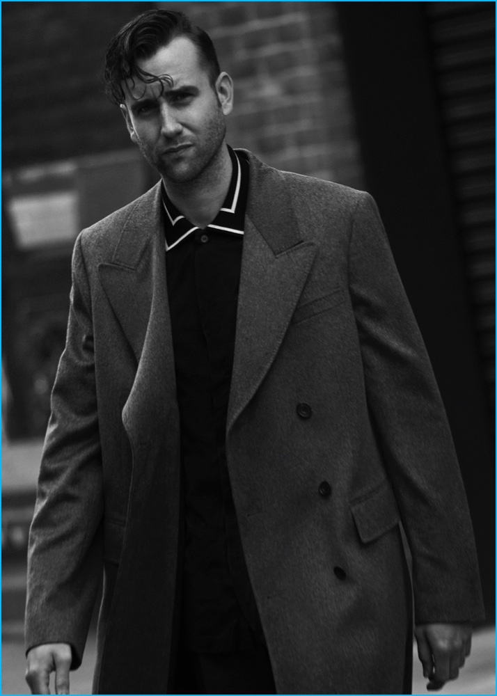 Matthew Lewis pictured in London, wearing an E.Tautz coat with a Paul Smith polo shirt and Dunhill trousers.