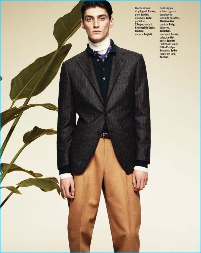 Mihai Bran embraces tailored separates for fall, donning Z Zegna trousers with a pinstripe Caruso jacket.