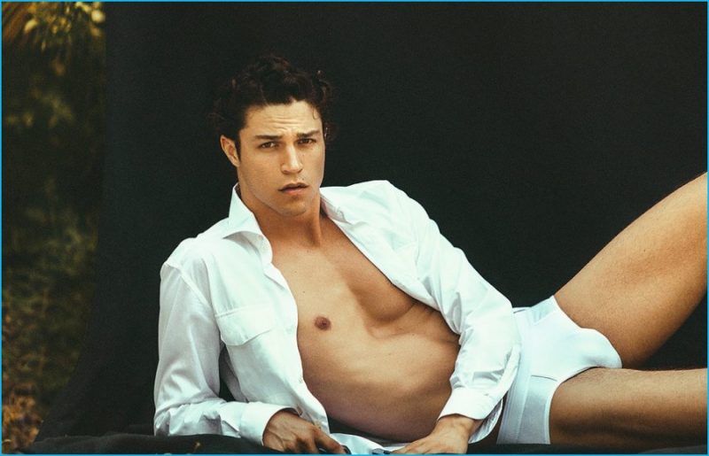 Miles McMillan sports an Ermenegildo Zegna Couture open shirt with a Springfield swimsuit.