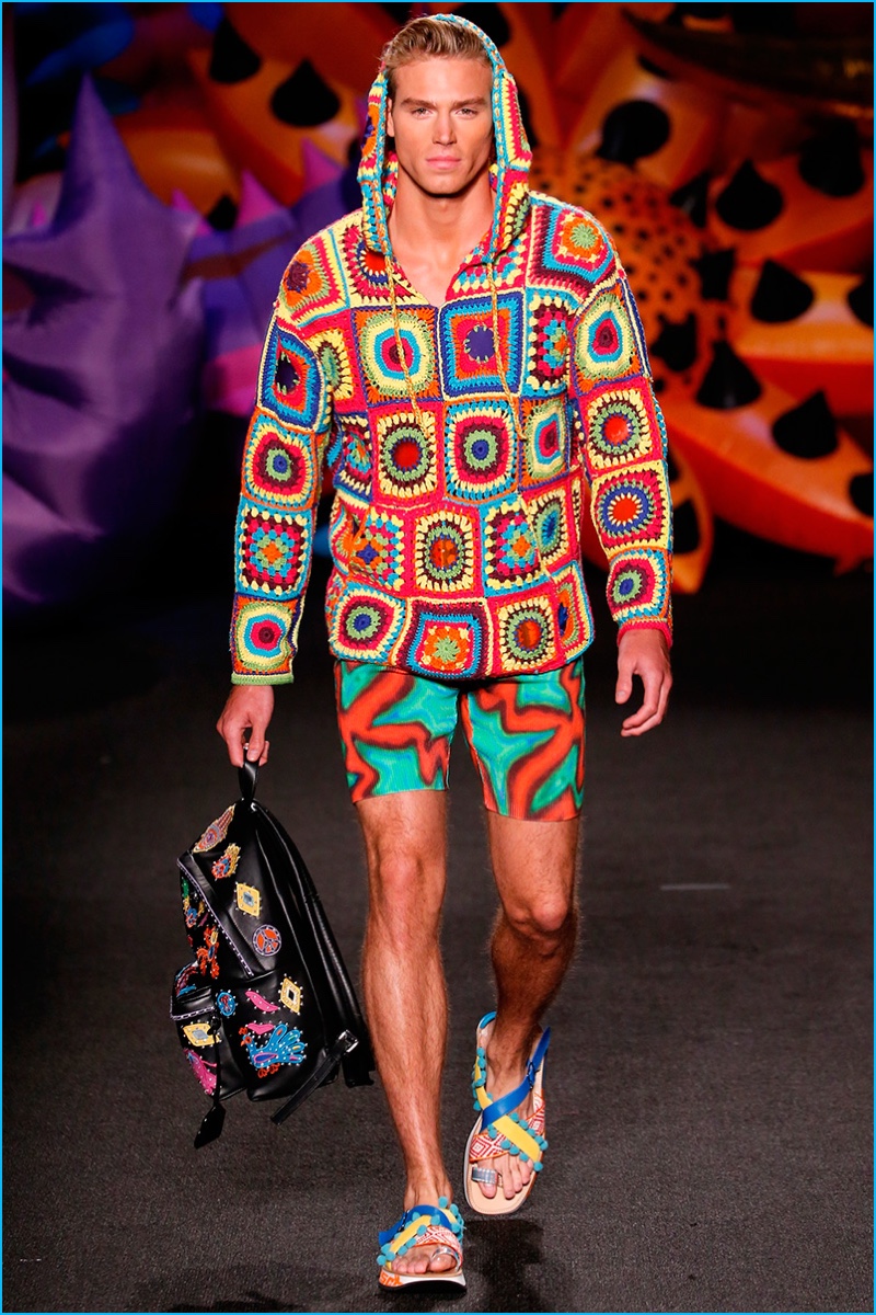 Moschino is festival ready with a psychedelic pullover and biking shorts.