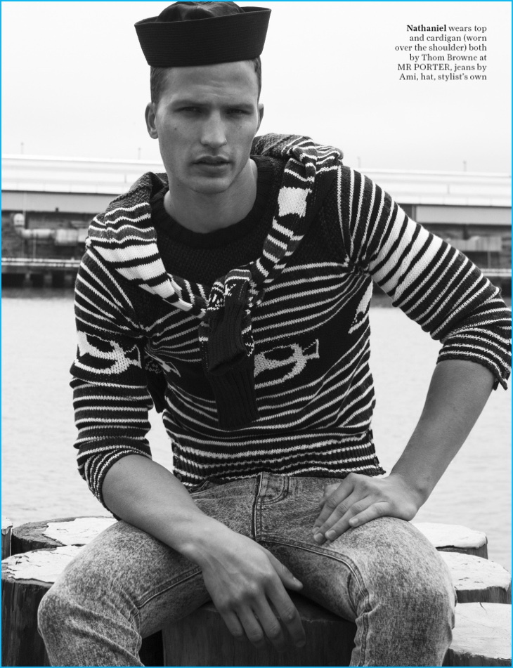 Remixing stripes, Nathaniel Visser dons a Thom Browne cardigan set with AMI jeans.