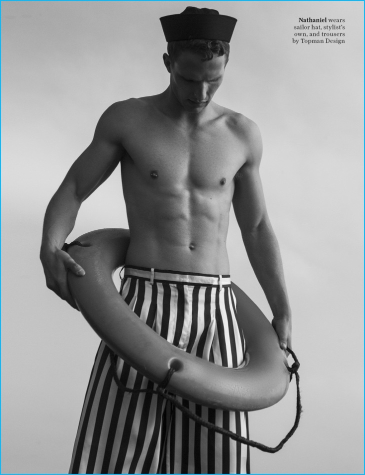 Nathaniel Visser dons wide-cut striped trousers from Topman Design.