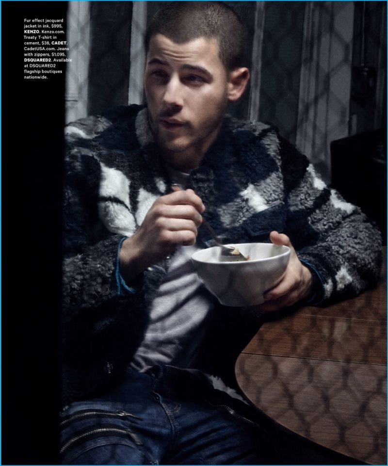 Nick Jonas sports a statement fur jacket from Parisian brand Kenzo.