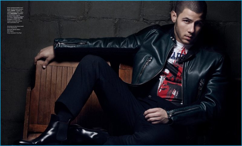 Nick Jonas pictured in a Lanvin leather jacket with a graphic Dsquared2 t-shirt.