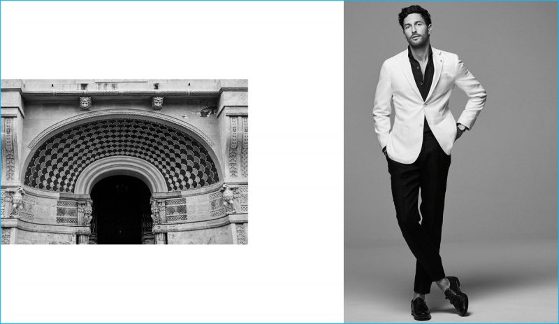Noah Mills cuts a dapper shape in a white jacket, worn with smart black separates from Massimo Dutti.