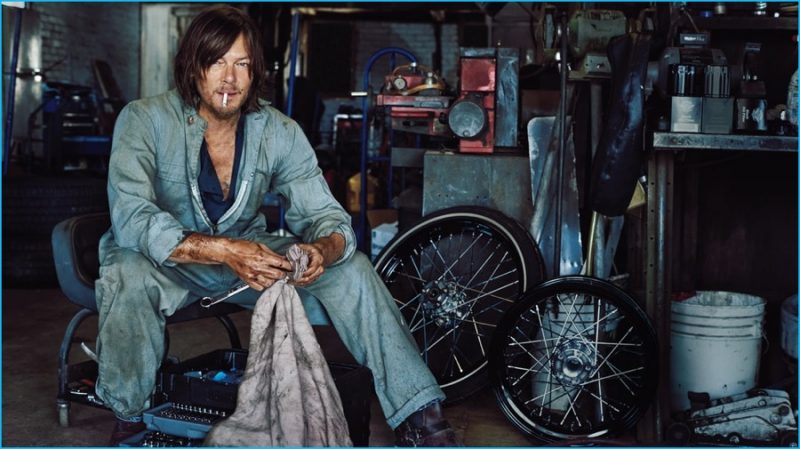 Norman Reedus gets his hands dirty in this photo by Marc Hom for Men's Journal.
