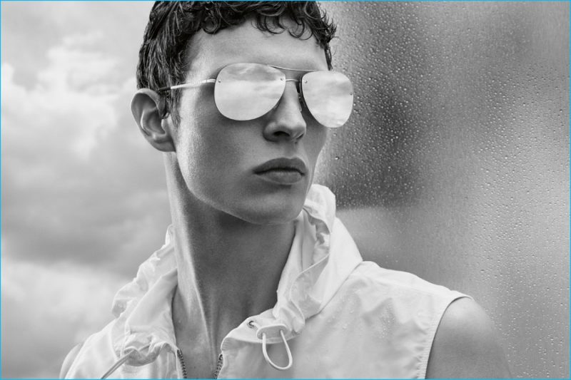 Tim Schuhmacher sports mirrored sunglasses from Prada Linea Rossa.