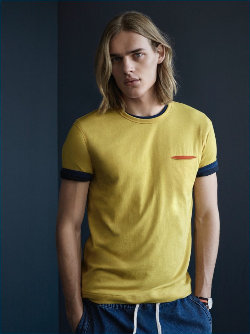 Ton Heukels sports a contrast pocket tee from YMC x River Island collection.