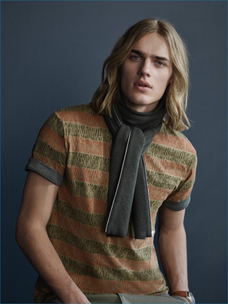 Ton Heukels is front and center in a zip scarf and print t-shirt from YMC x River Island collection.
