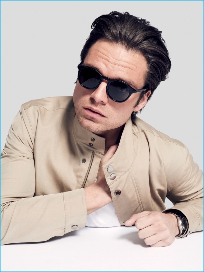 Sebastian Stan is front and center in Dior Homme sunglasses with a Ermenegildo Zegna jacket and Rolex watch.