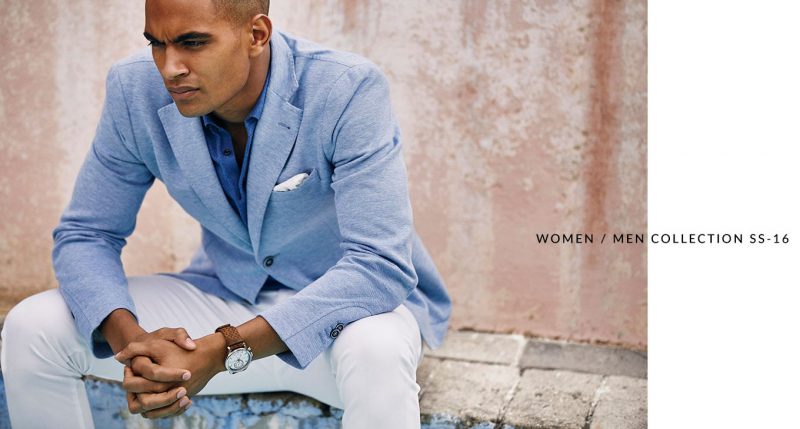 Terence Telle sports a summer look from Massimo Dutti, tackling a light blue jersey blazer with white pants.