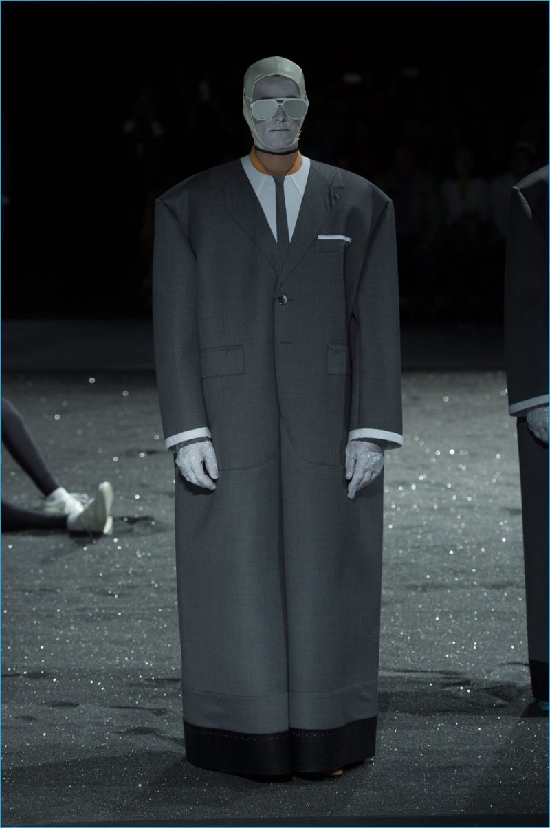 Thom Browne's little grey suit gets an oversize wetsuit makeover.