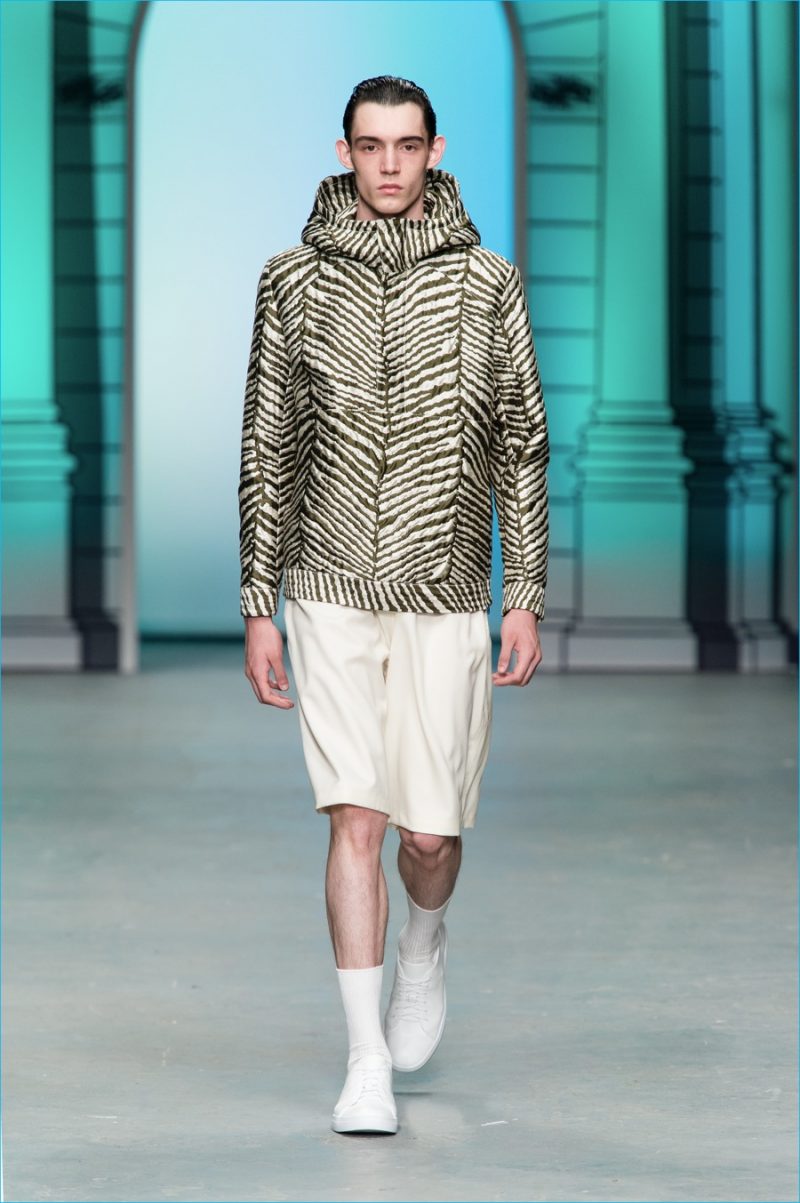 Tiger of Sweden has a sporty moment with a printed hooded jacket and slouchy shorts.