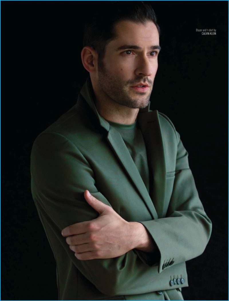 Tom Ellis dons a green suiting number from Calvin Klein.