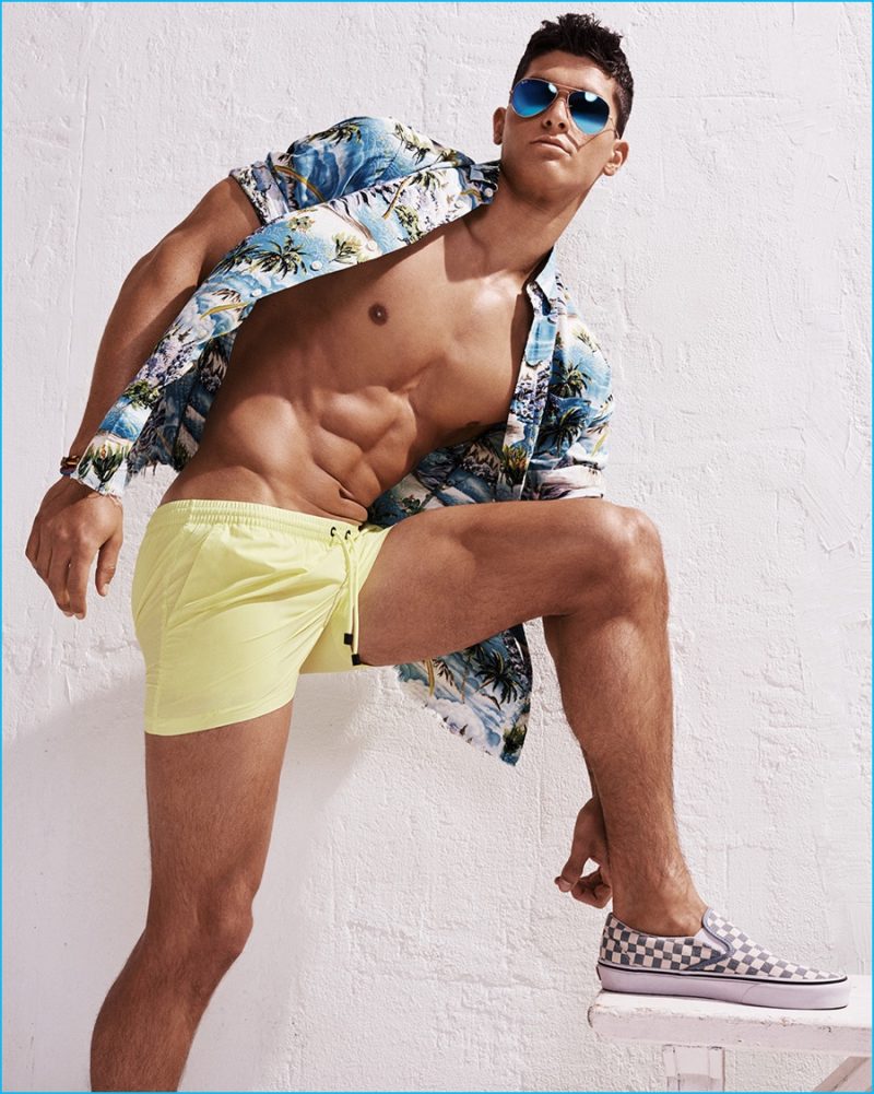Trevor Signorino keeps cool in yellow Onia swim shorts.