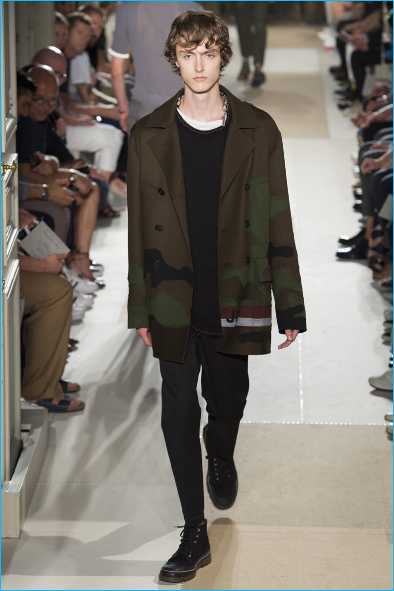 Valentino embraces a sporadic take on camouflage for spring-summer 2017.