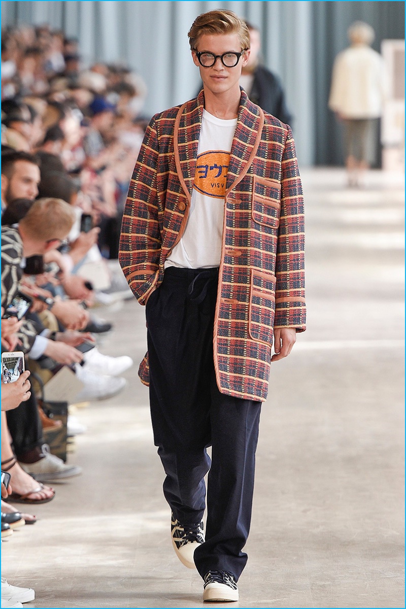 Visvim has a chic plaid moment with a shawl collar coat.