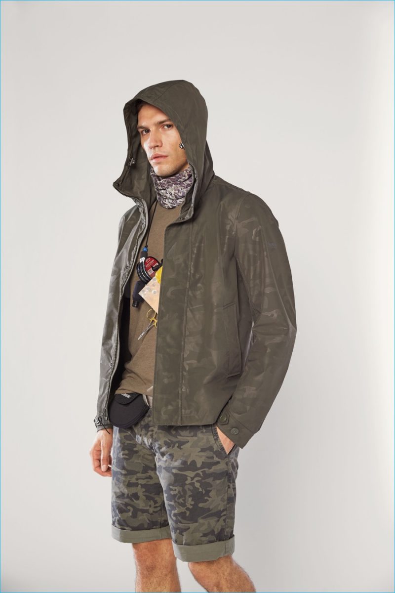 Woolrich John Rich & Bros. embraces camouflage for the season, turning out relaxed shorts and a water resistant jacket.