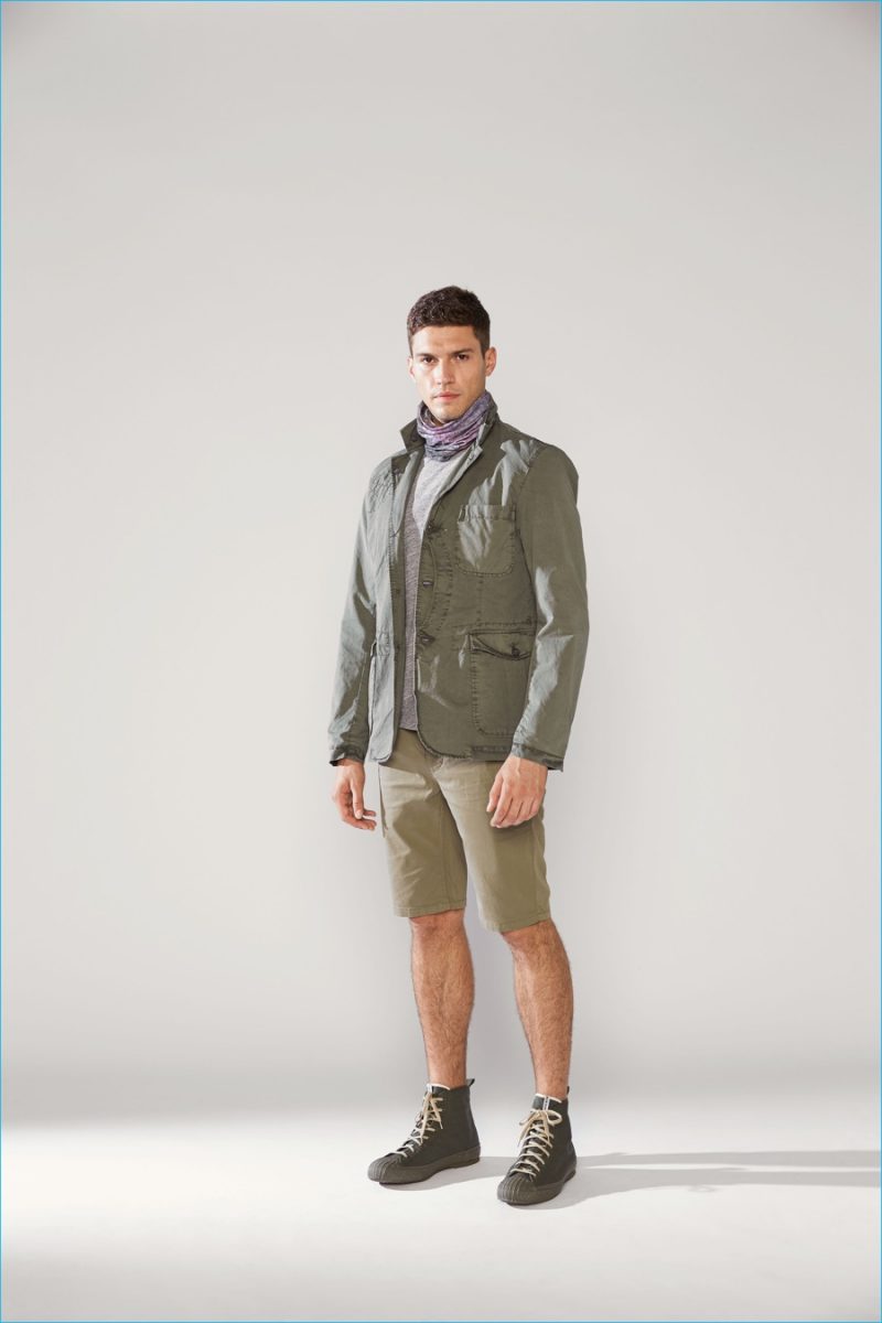 Woolrich John Rich & Bros. stands by monochromatic dressing with a casual green look.