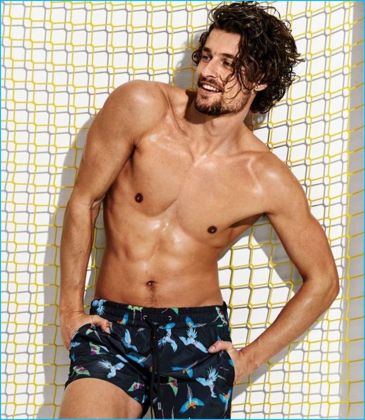 Wouter Peelen is all smiles in a pair of bird print Calzedonia swim shorts.
