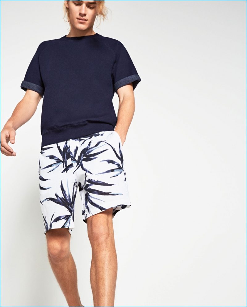 Ton Heukels is a cool image in tropical print shorts and a short-sleeve top from Zara Man's Indigo Spirit collection.