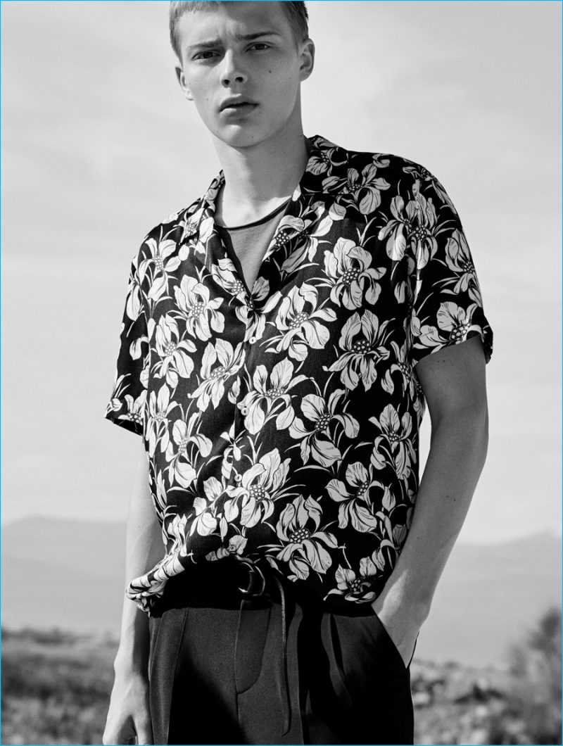 Summery Prints: Otto-Valter Vainaste dons a floral print bowling shirt with a long t-shirt and darted trousers from Zara Man.