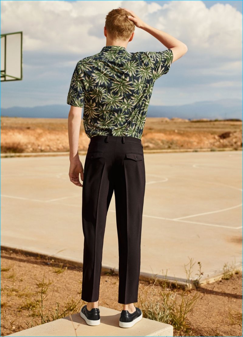 Hawaiian Patterns: Otto-Valter Vainaste models a patterned bowling shirts with darted trousers and basic sneakers from Zara Man.