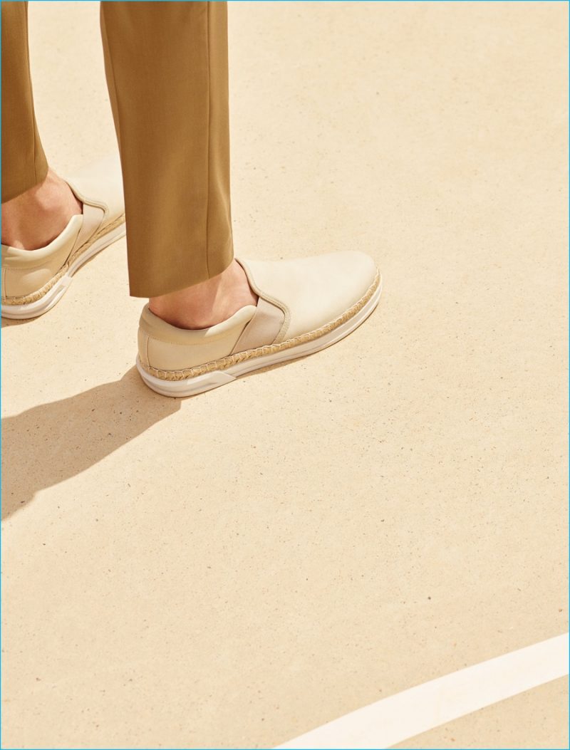 Comfort Soles: Zara Man's braided sneakers are pictured with its technical fabric trousers.