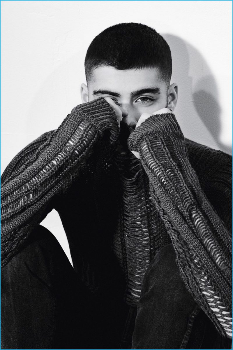 Zayn Malik pictured in a Louis Vuitton sweater with AG Jeans denim.