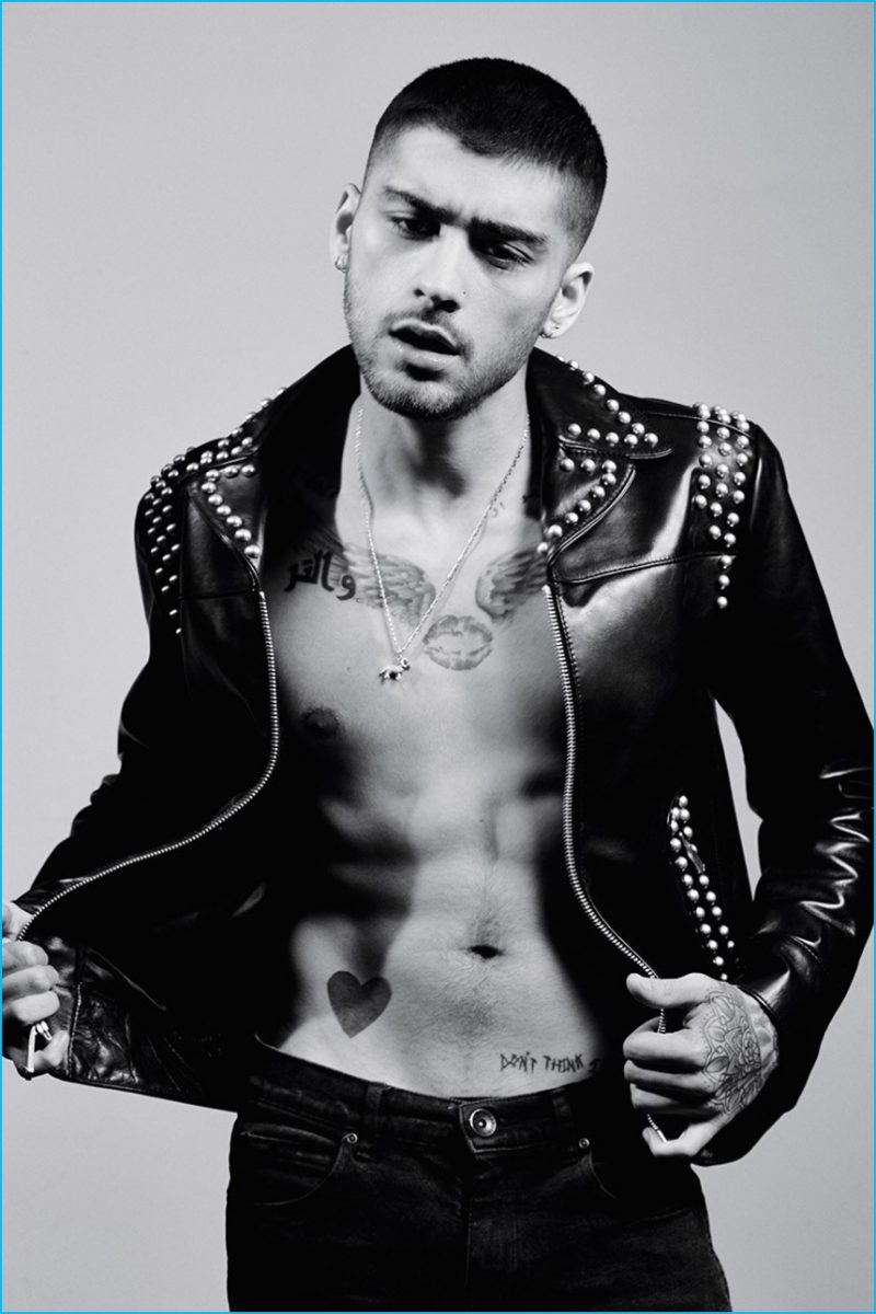 Zayn Malik rocks a studded Marc Jacobs leather biker jacket with his own skinny jeans.